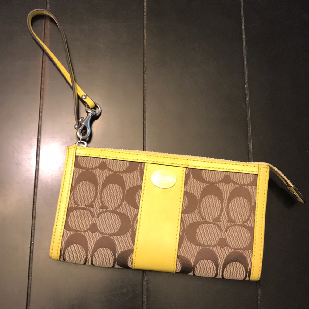 Coach yellow and brown monogram wristlet